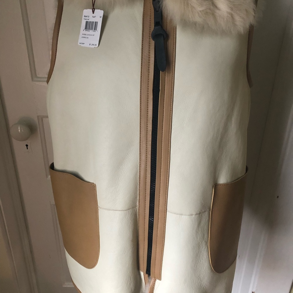 Coach leather and shearling vest…reversible.